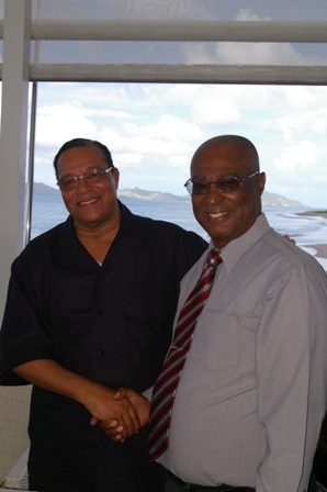Nation of Islam Minister, Hon. Louis Farrakhan and Premier of Nevis, Hon. Joseph Parry sharing a light momen